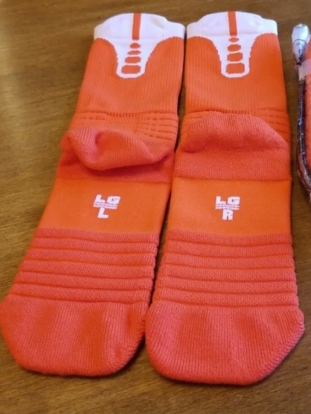 2 pair Nike peeformance basketball socks - orange & white, red & black